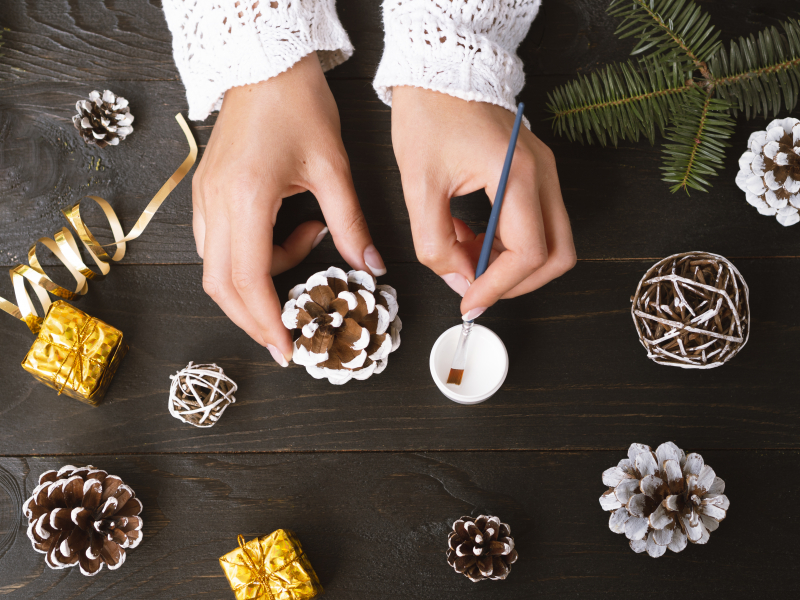 top-view-woman-making-christmas-decorations